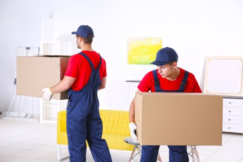 Commercial moving team planning a business relocation in Queens Park