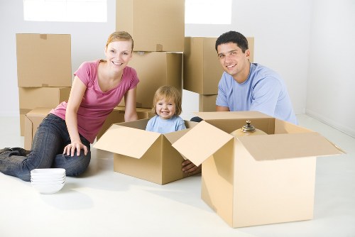 Professional movers handling a residential move in Queens Park
