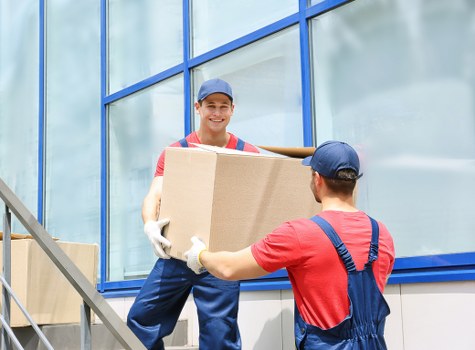 Removal team preparing for a home move in Queens Park