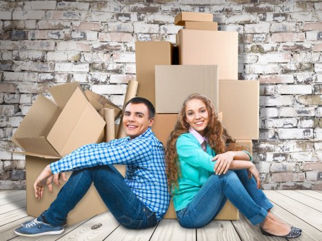 Packed boxes and furniture ready for a local house move