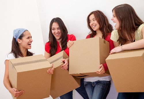 Removal team planning a house move in Queens Park