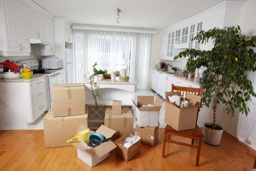 Local movers handling stair access in a Queens Park property