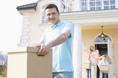 Removal van and movers completing a Queens Park moving service