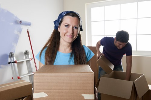 Packed office boxes and furniture ready for transport