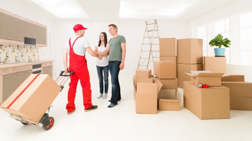 Removal team helping with a home move in Queens Park
