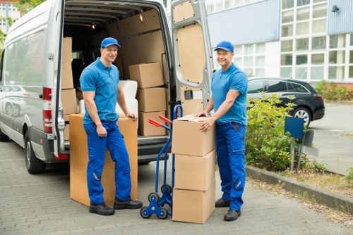 Packed business items ready for transport during a local office relocation