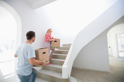 Removal crew working with stairs and access challenges in Queens Park